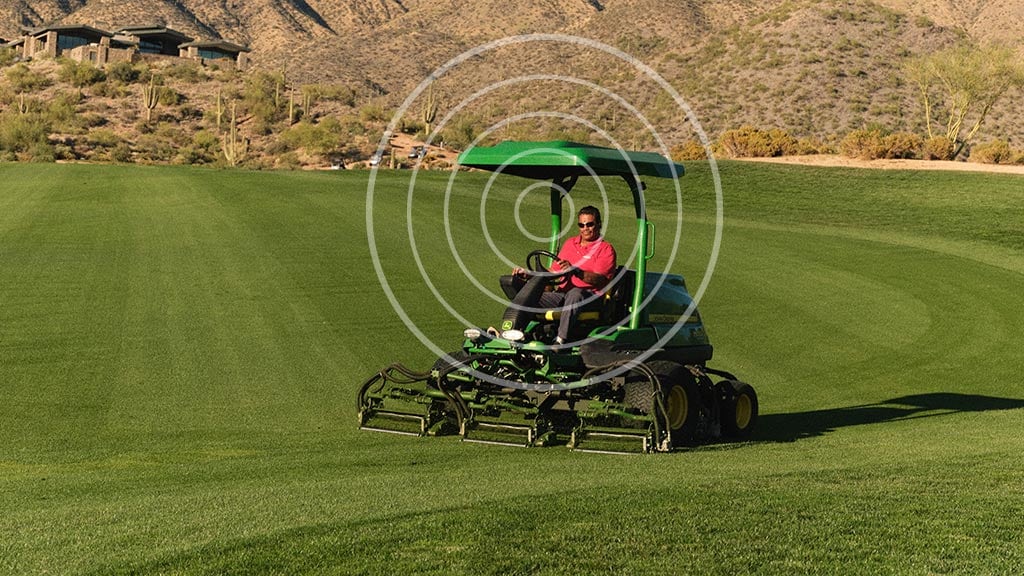 Image of a fairway mower on a golf course with a signal overlay over the image