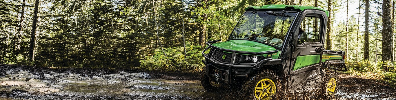gator driving through mud