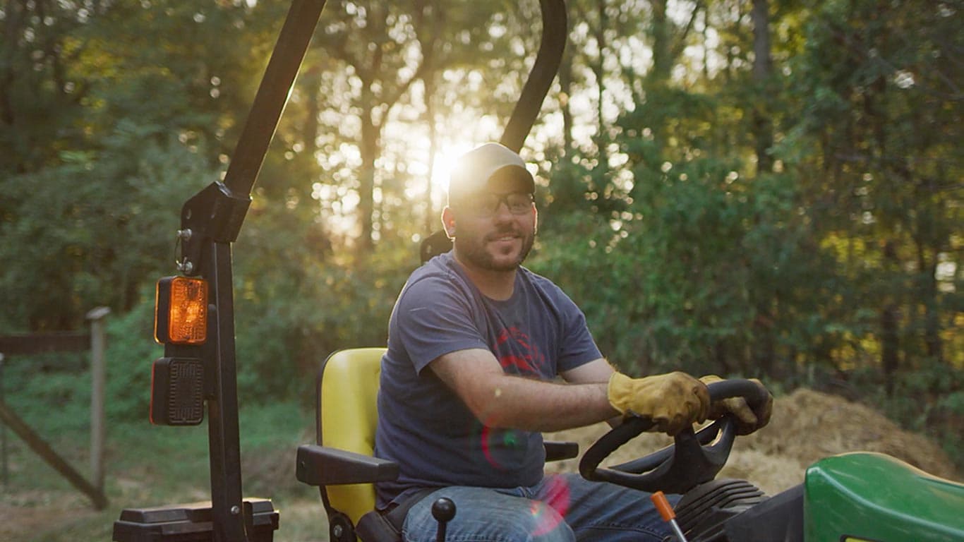 Man riding a tractor