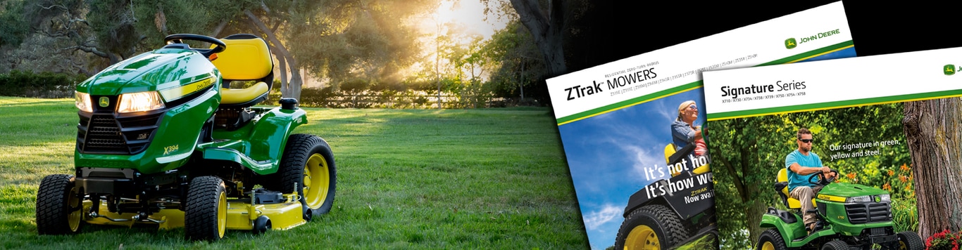 Riding mower sitting on lawn with images of brochures