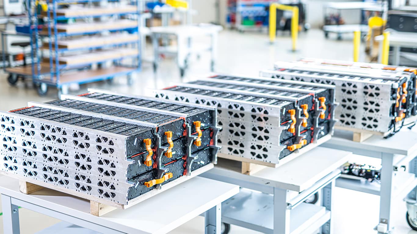 Kreisel battery packs laid out on a table at Kreisel's production facility