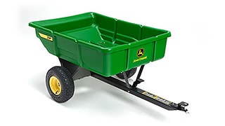 A green cart mower attachment.