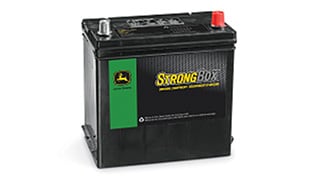 A compact John Deere equipment battery.