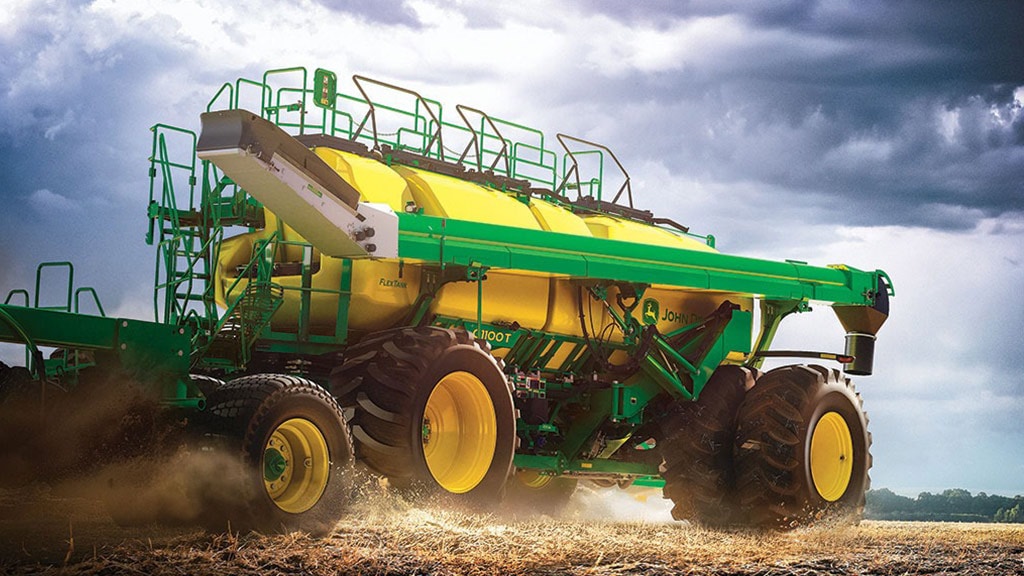 Image of a C110T Air Cart in a dusty field