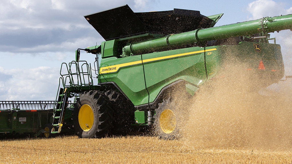 Photo of X9 Combine in the field.