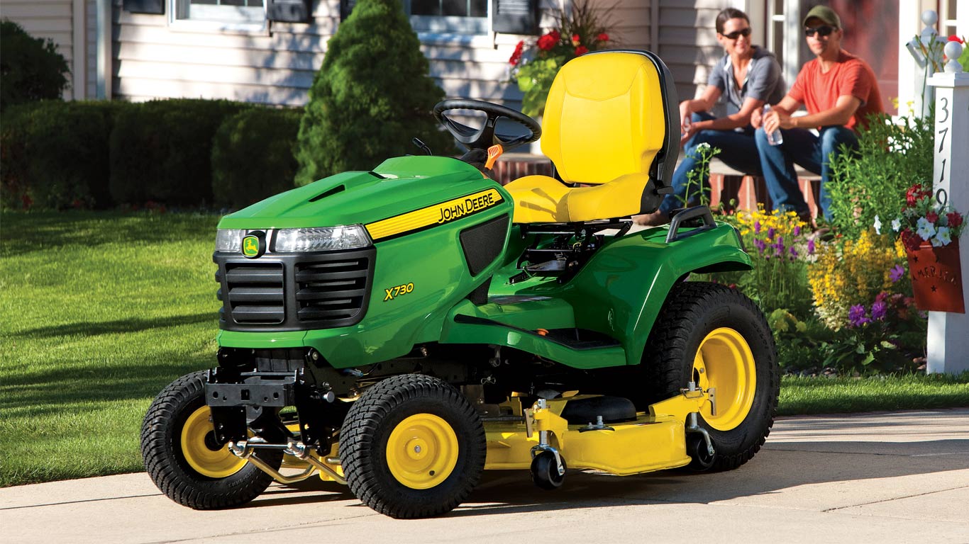 lawn tractor sitting on front lawn