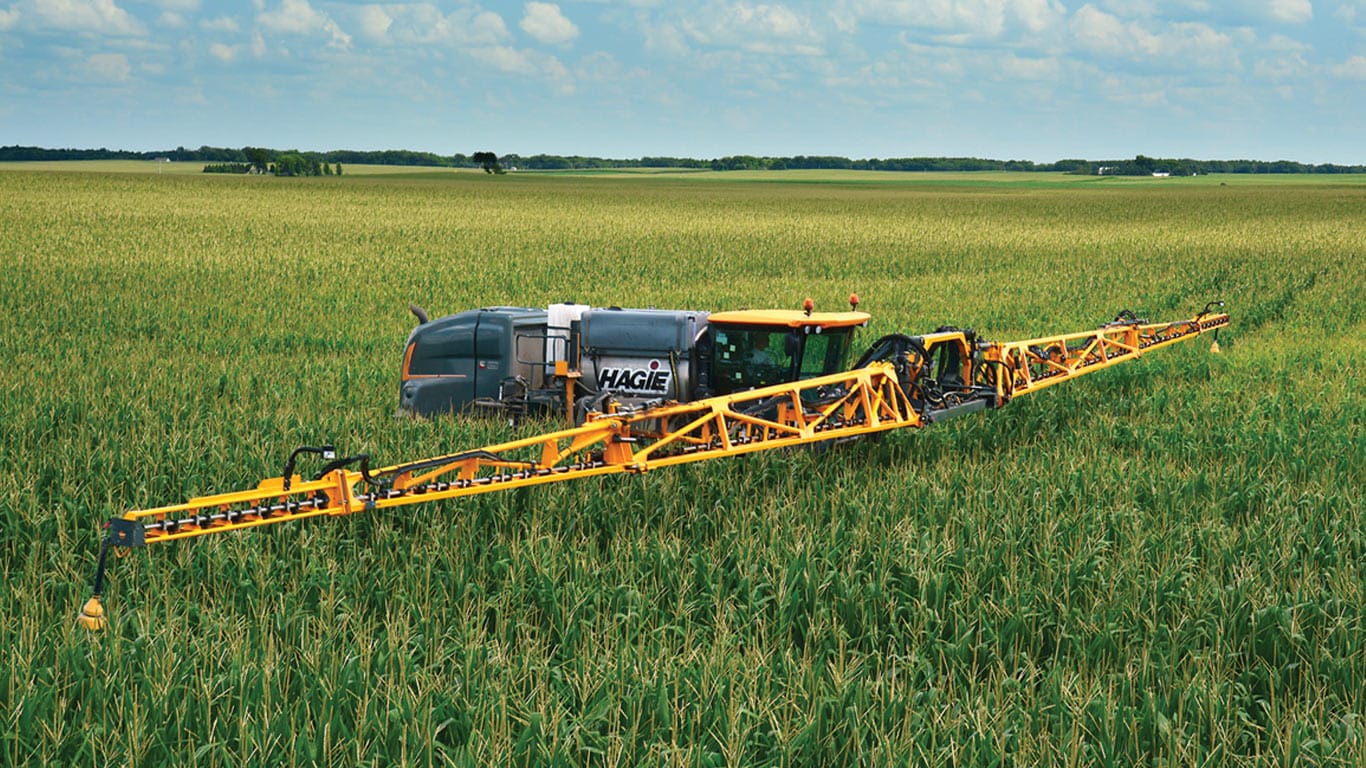 Hagie sprayer in field