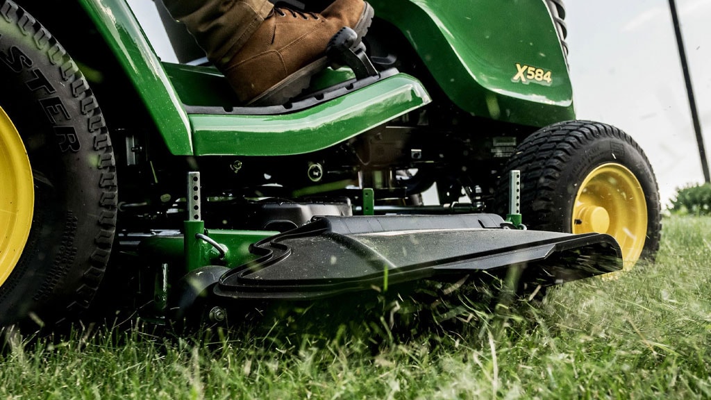 Image of Mulching lawn tractor rake