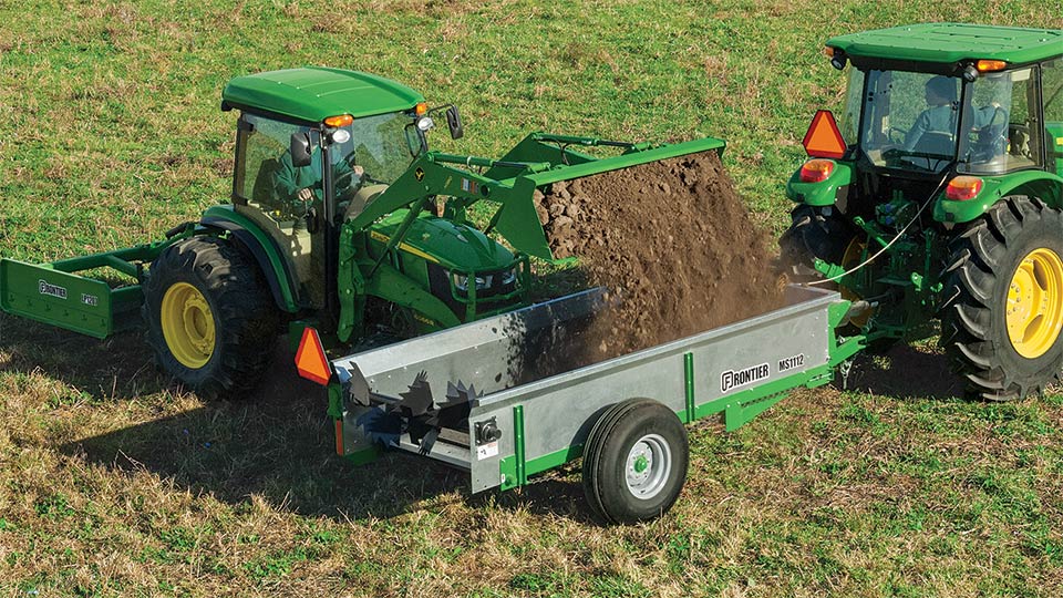 livestock attachments in front of stalls