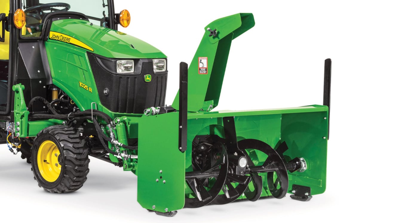 Studio Image of a 47-inch Heavy-Duty Snow Blower on a 1025R Compact Tractor