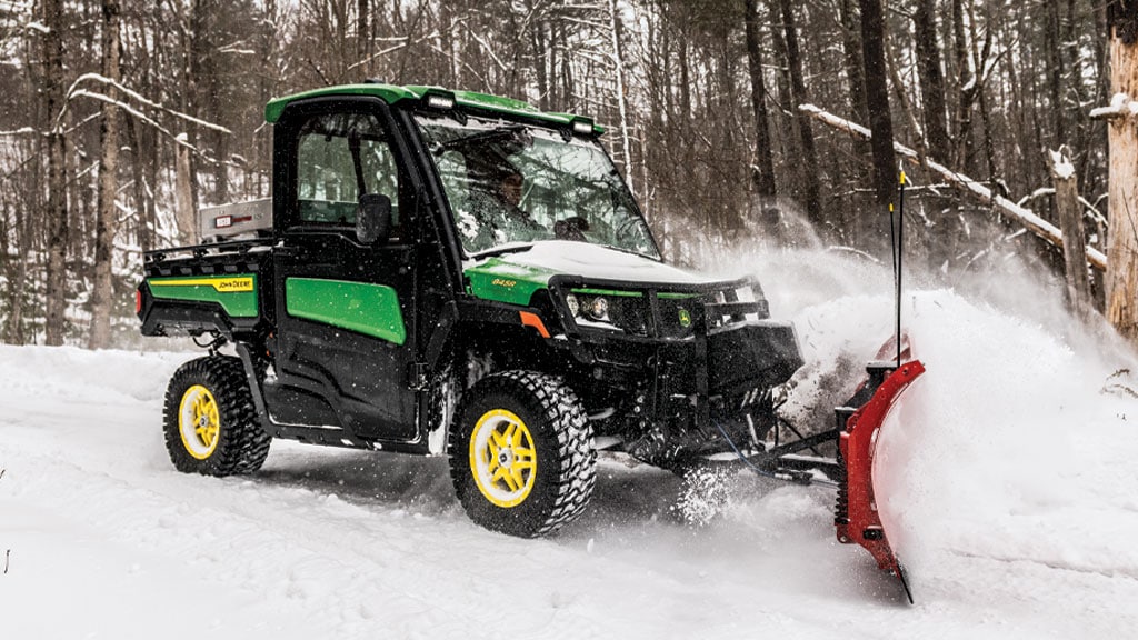 XUV 845R remove snow with a Western front blade