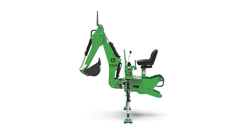 A left-facing studio shot of a green backhoe implement on a white background.