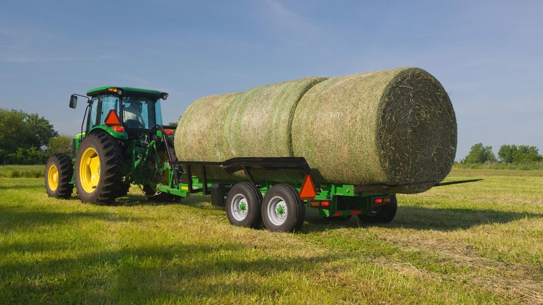 field image of Frontier™ BC11 bale carrier attached to a tractor