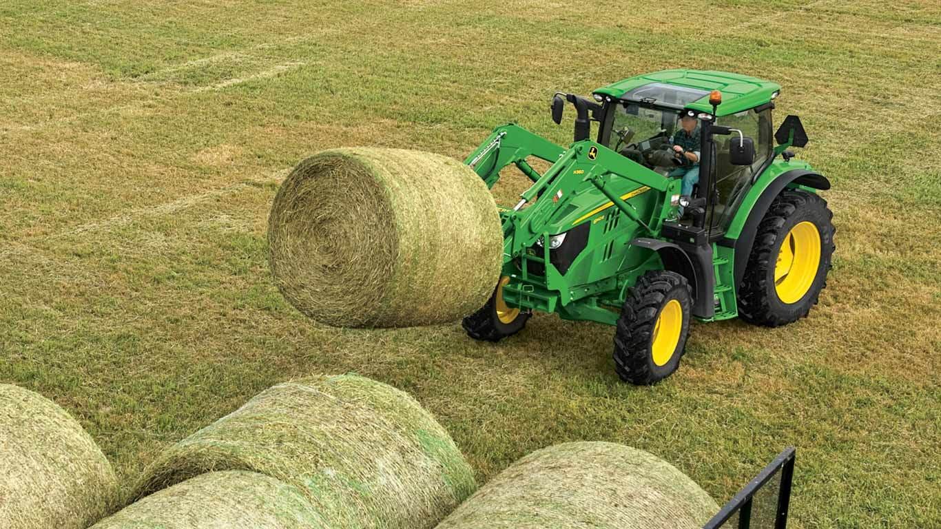 field image of ab12 bale spear on tractor in field