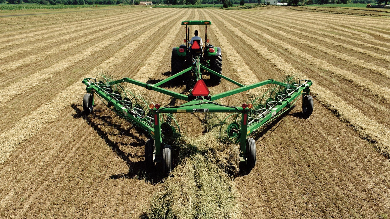 field image of Frontier™ wr12 wheel rake attached to a tractor