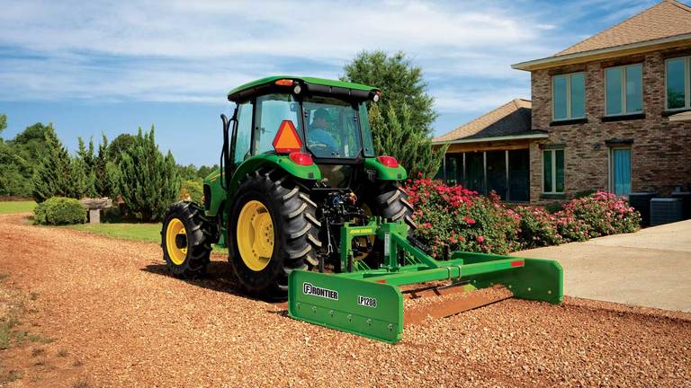 field image of Frontier LP12 series land plane on a tractor