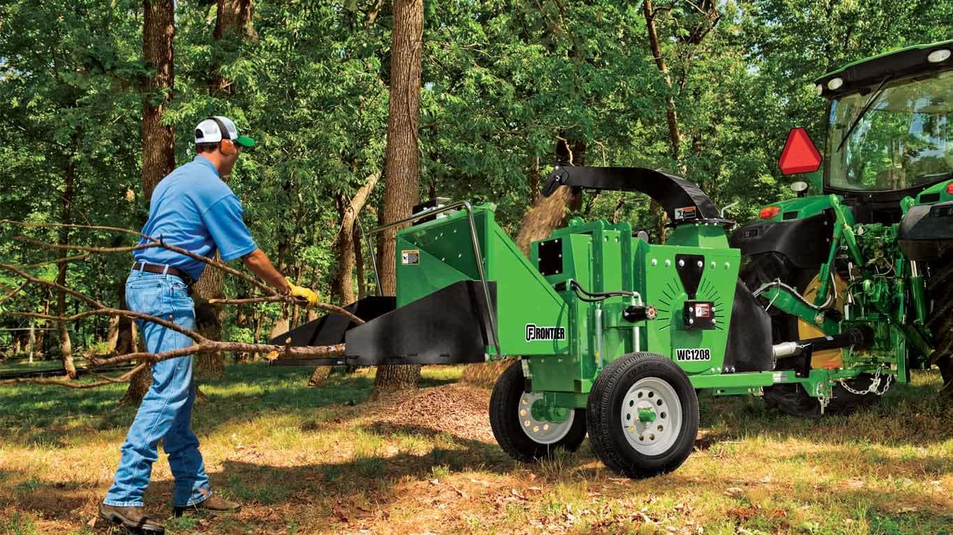 field image of Frontier WC12 series wood chipper attached to a tractor