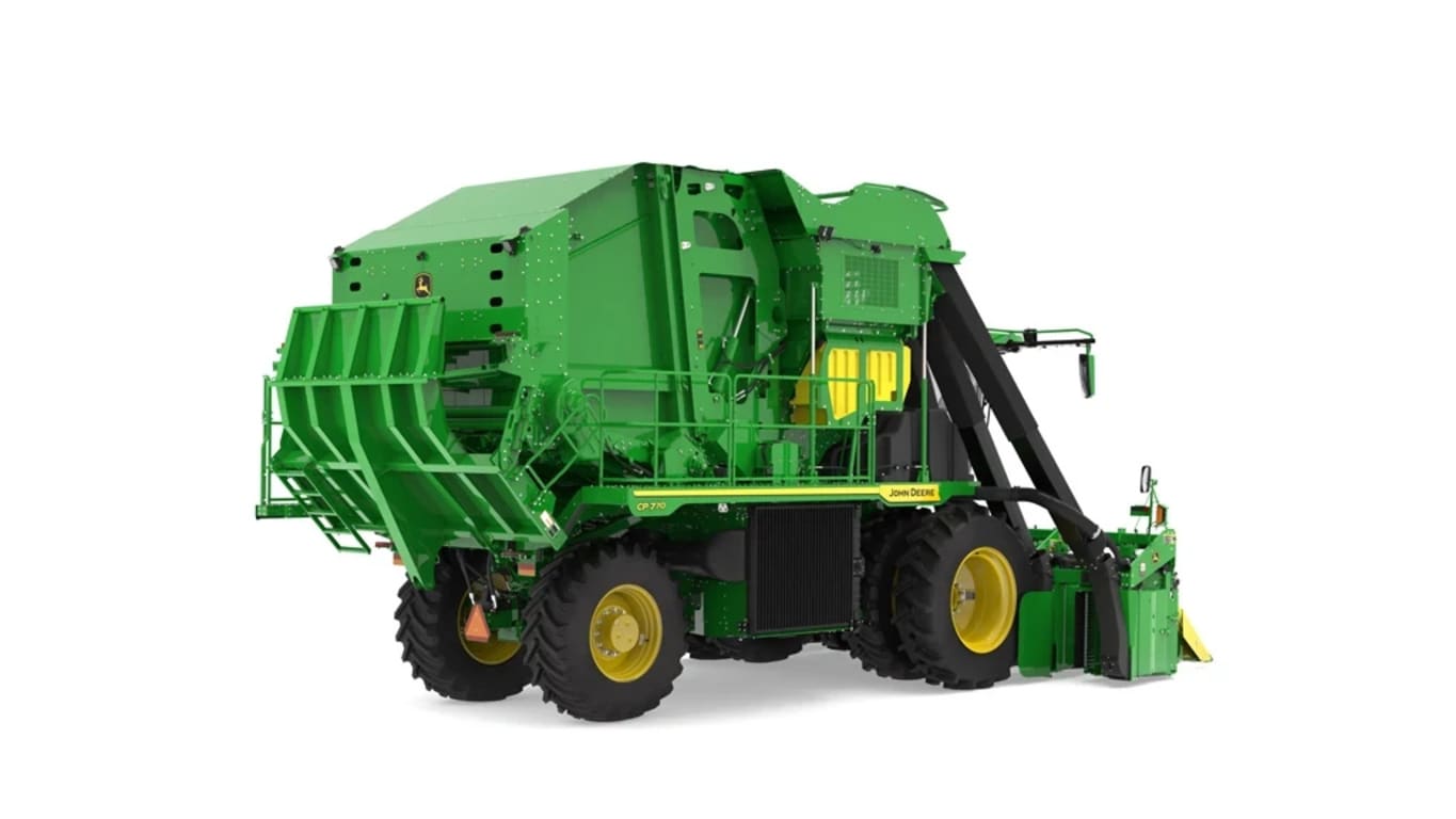 rear-right studio shot of a CP700 cotton picker on a white background