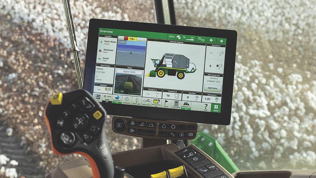 a close-up shot of a G5Plus display in the cab of a John&nbsp;Deere cotton harvester