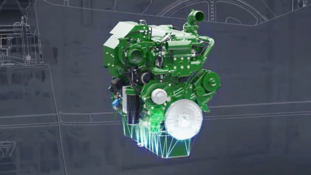 Photo of an uninstalled John&nbsp;Deere JD14 13.6L engine against a blueprint-like background