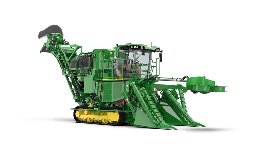 A studio photo of a CH770 Sugar Cane Harvester with tracks on a white, seamless setting.
