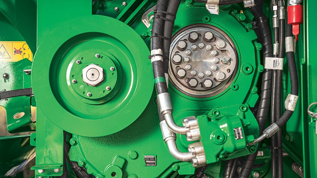 A close-up photo showing the DuraSync Chopper System on a CH Series Sugar Harvester.