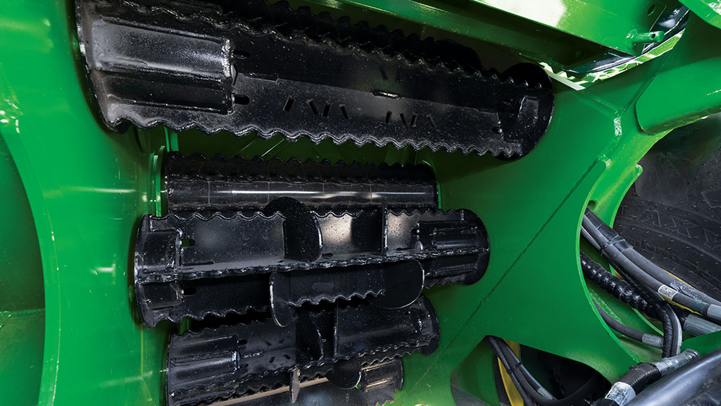 Close-up photo showing the feedroller system and modular chopper in a CH Series Sugar Harvester.