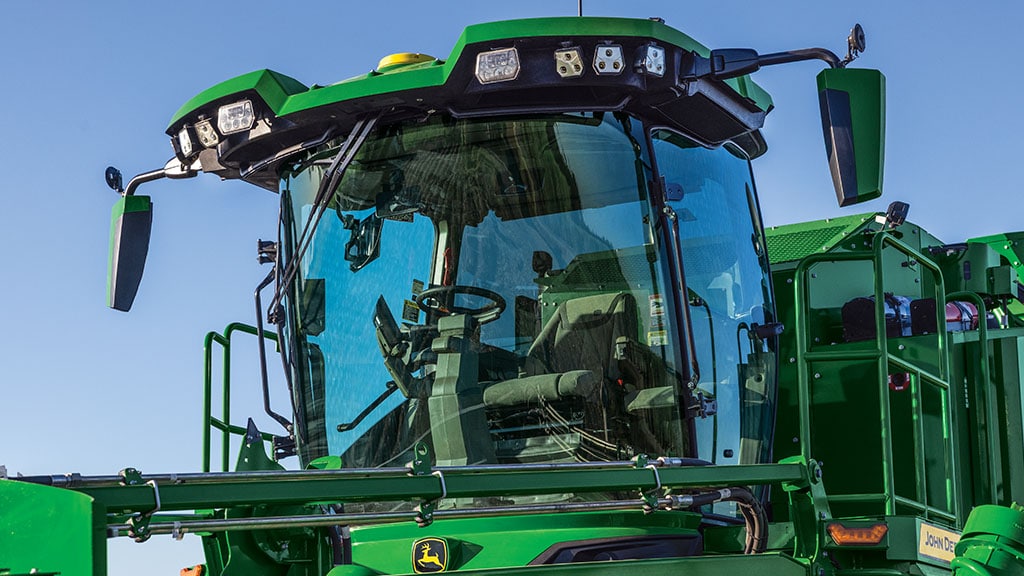 A photo looking up at the front of the cab on a CH Series Sugar Harvester.