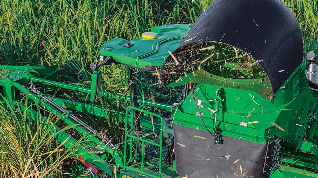 Overhead photo showing sugar cane processing through a CH Series Sugar Harvester.