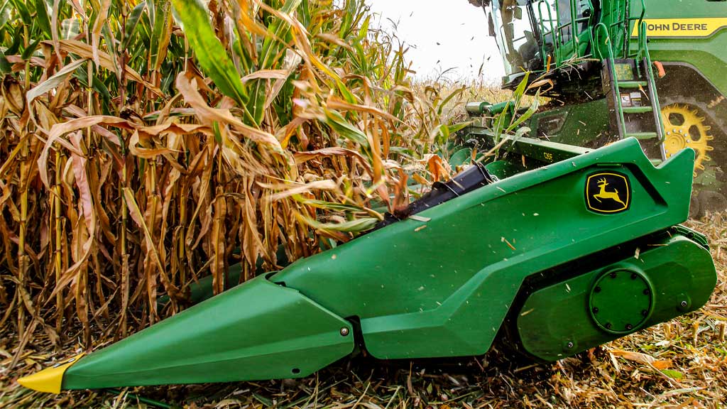 Close-up photo of a crop divider nose on a John Deere corn head