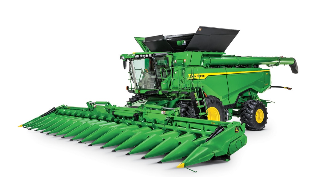 Photo of a John Deere X9 1000 Coimbine with a corn head, on a white background