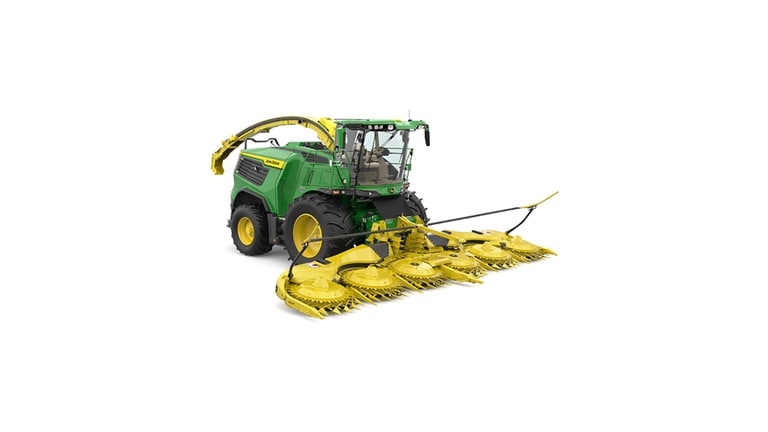 A front-right-facing green F9 1000 self-propelled forage harvester with a yellow header on a white background.