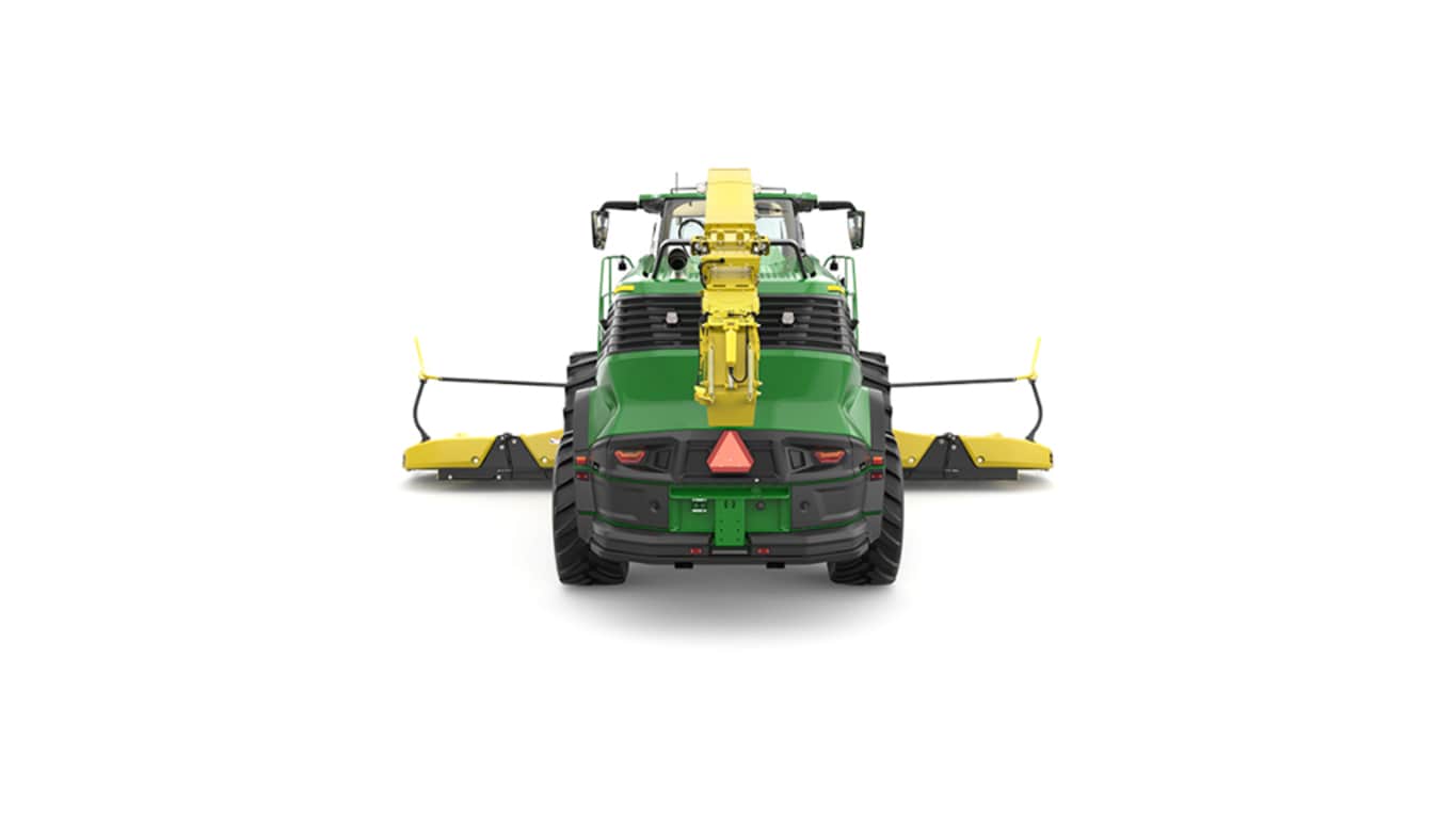 A rear-facing green F9 1000 self-propelled forage harvester with a yellow header on a white background.