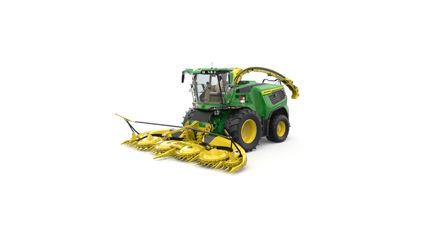 A front-left-facing green F9 500 self-propelled forage harvester with a yellow header on a white background.