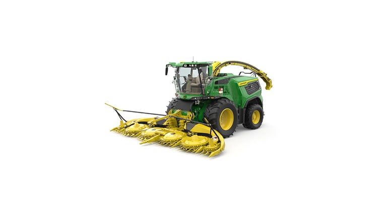 A front-left-facing green F9 500 self-propelled forage harvester with a yellow header on a white background.