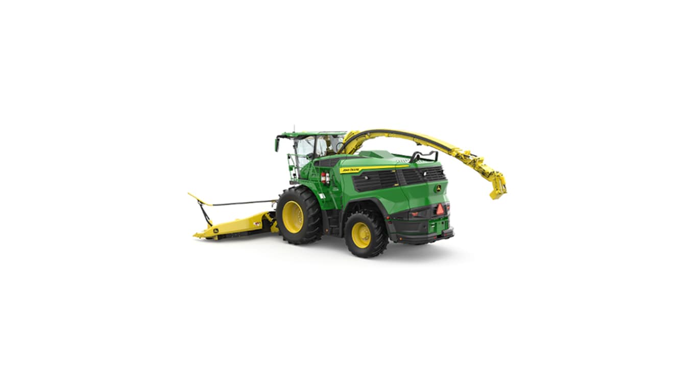 A rear-left-facing green F9 500 self-propelled forage harvester with a yellow header on a white background.