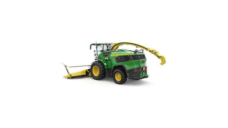 A rear-left-facing green F9 500 self-propelled forage harvester with a yellow header on a white background.