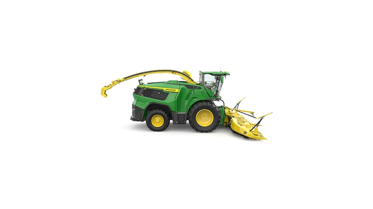 A right-facing green F9 500 self-propelled forage harvester with a yellow header on a white background.