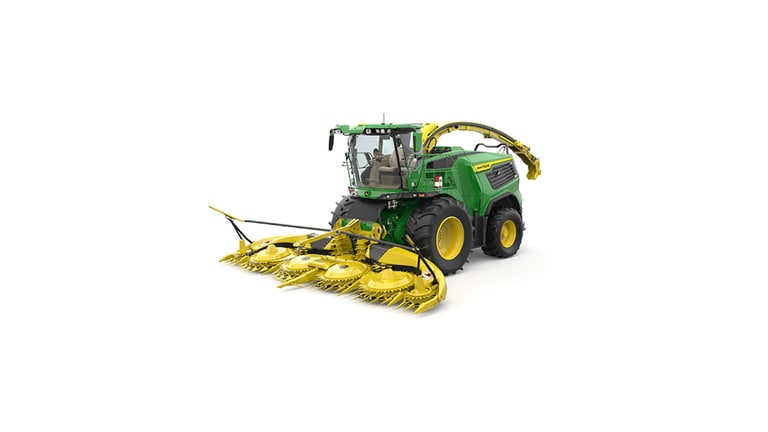 A front-right-facing green F9 600 self-propelled forage harvester with a yellow header on a white background.