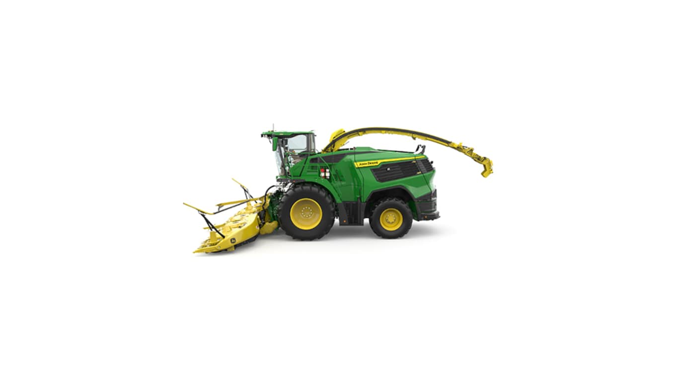 A left-facing green F9 600 self-propelled forage harvester with a yellow header on a white background.