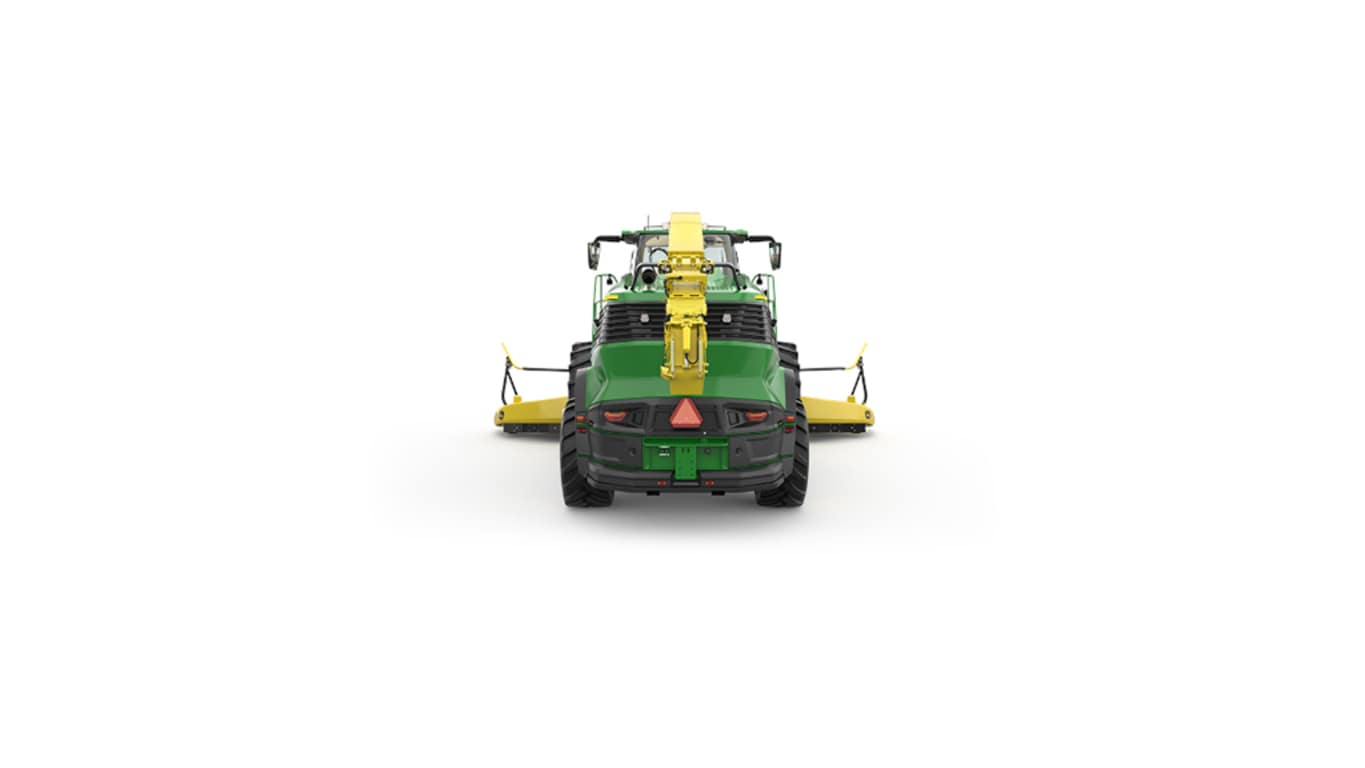 A rear-facing green F9 600 self-propelled forage harvester with a yellow header on a white background.