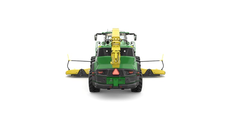A rear-facing green F9 700 self-propelled forage harvester with a yellow header on a white background.