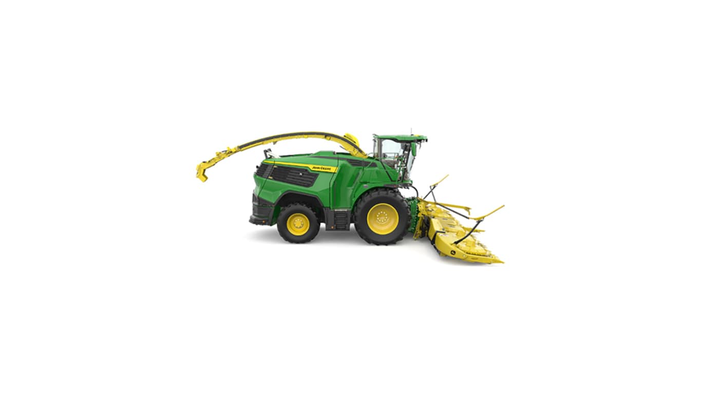 A right-facing green F9 700 self-propelled forage harvester with a yellow header on a white background.