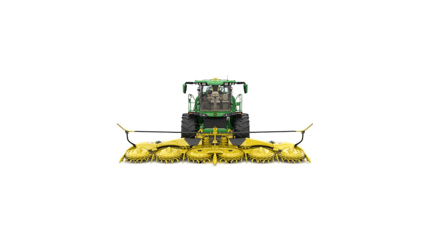 A front-facing green F9 900 self-propelled forage harvester with a yellow header on a white background.