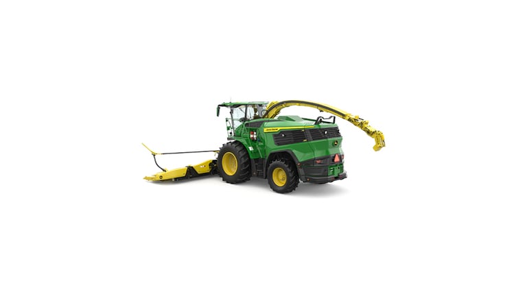 A rear-left-facing green F9 900 self-propelled forage harvester with a yellow header on a white background.