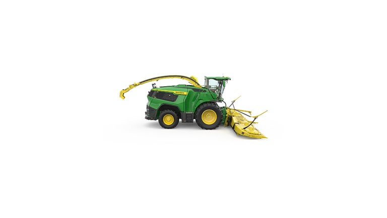A right-facing green F9 900 self-propelled forage harvester with a yellow header on a white background.
