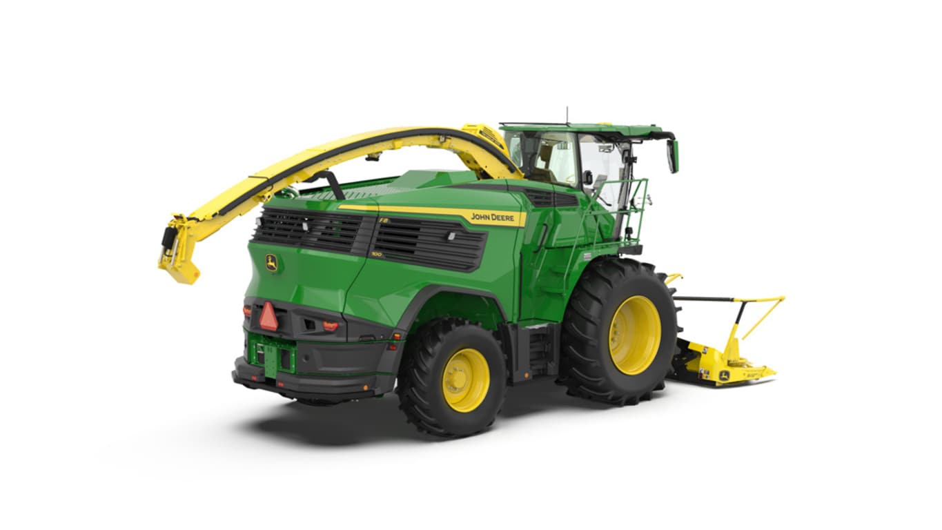 A rear-right-facing green F8 100 self-propelled forage harvester with a yellow header on a white background.