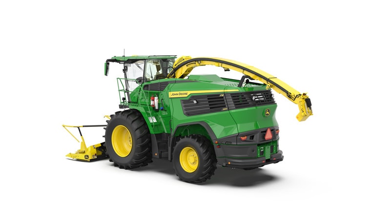 A rear-left-facing green F8 200 self-propelled forage harvester with a yellow header on a white background.