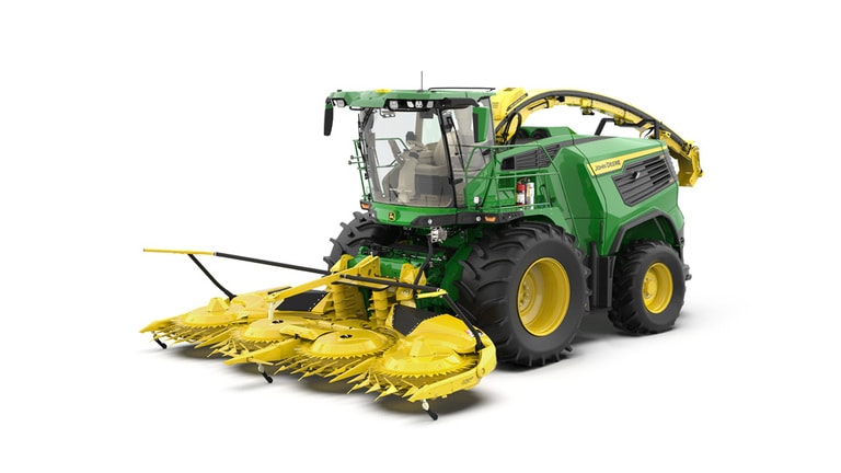 A front-left-facing green F8 500 self-propelled forage harvester with a yellow header on a white background.