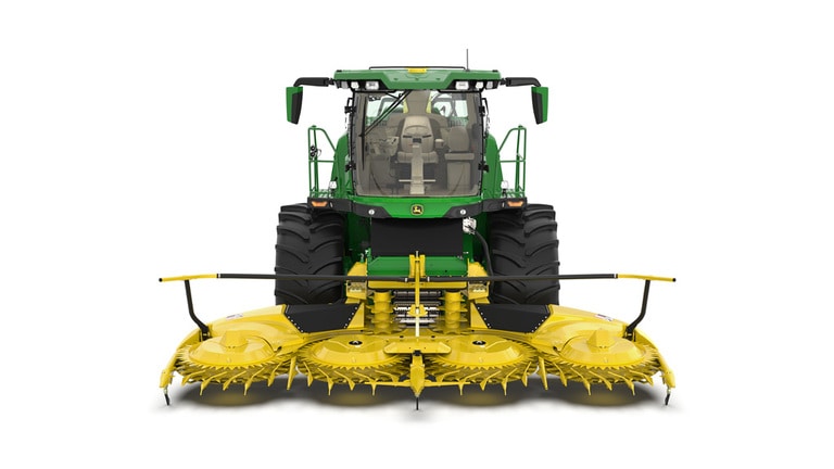 A front-facing green F8 500 self-propelled forage harvester with a yellow header on a white background.